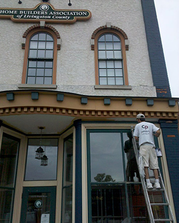 Building exterior being painted.